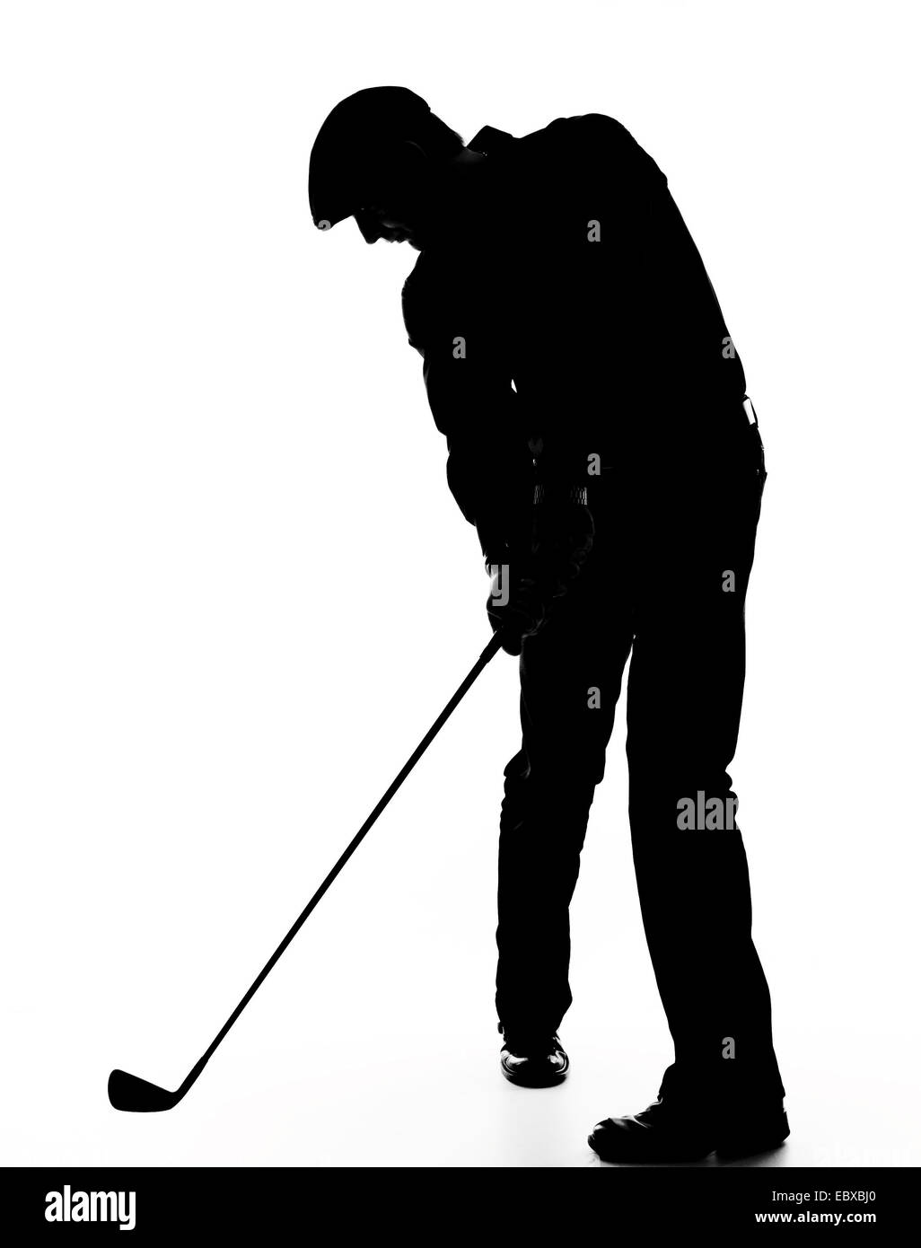 silhouette of a golfer Stock Photo