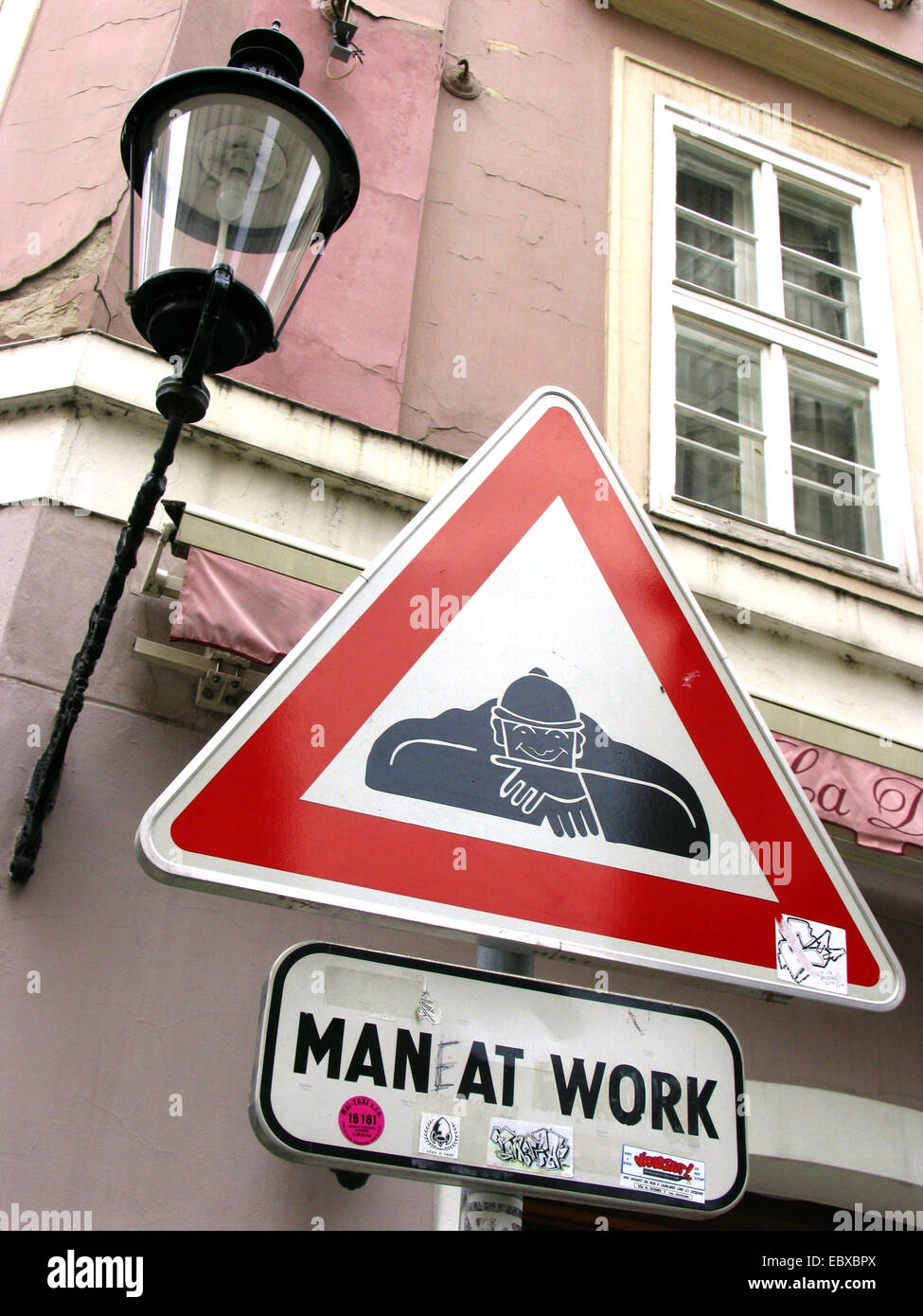 funny road sign in Bratislava, man at work, Slovakia Stock Photo