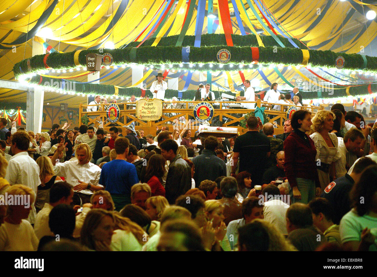 Oktoberfest in Munich, happy people in a beer tent, Germany, Bavaria, Muenchen Stock Photo