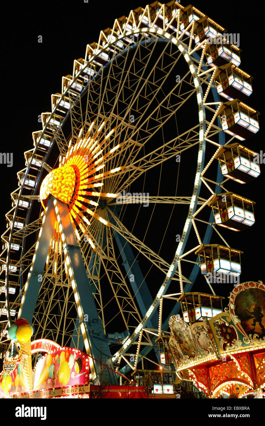 ferris wheel at the Oktoberfest in Munich at night, Germany, Bavaria ...