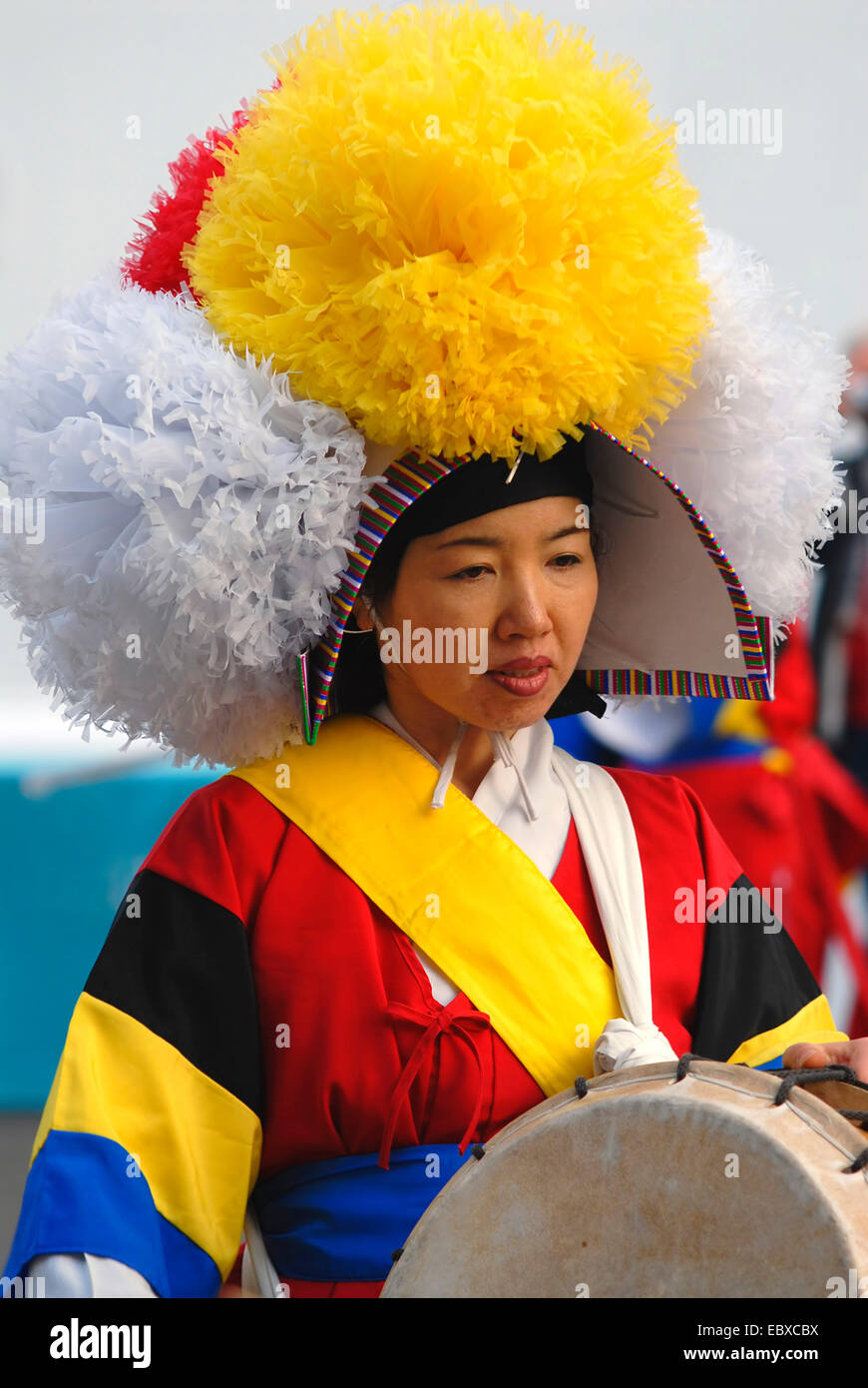 Korean Drummer in traditional costume performing during a performance, South Korea, Incheon Stock Photo