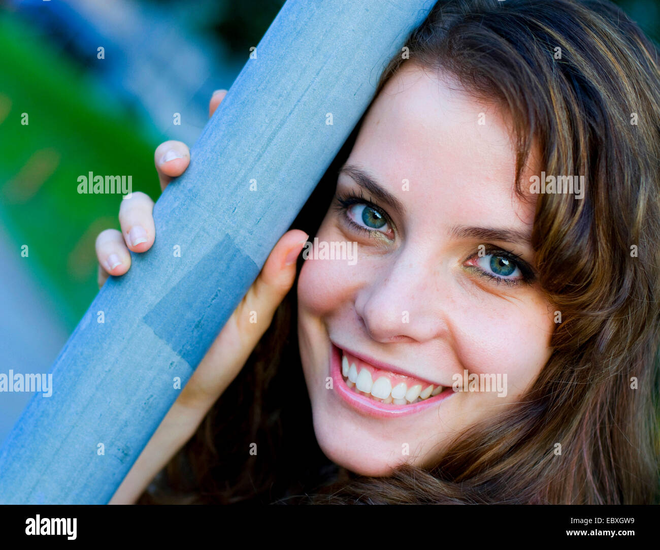 cute brown-haired woman smiling Stock Photo
