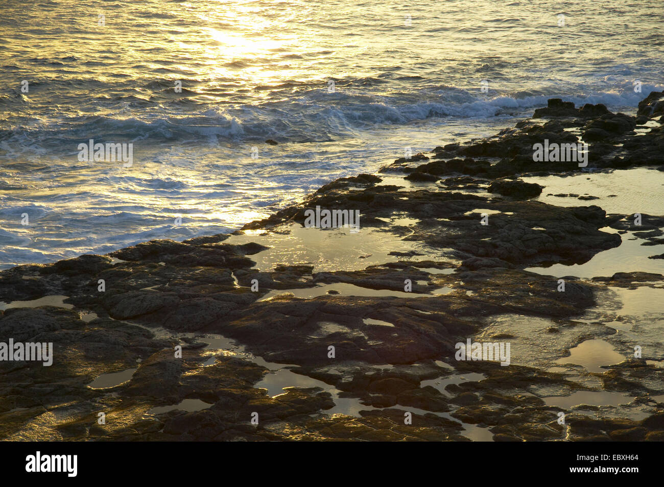 Lanzarote, surge in sunset light Stock Photo