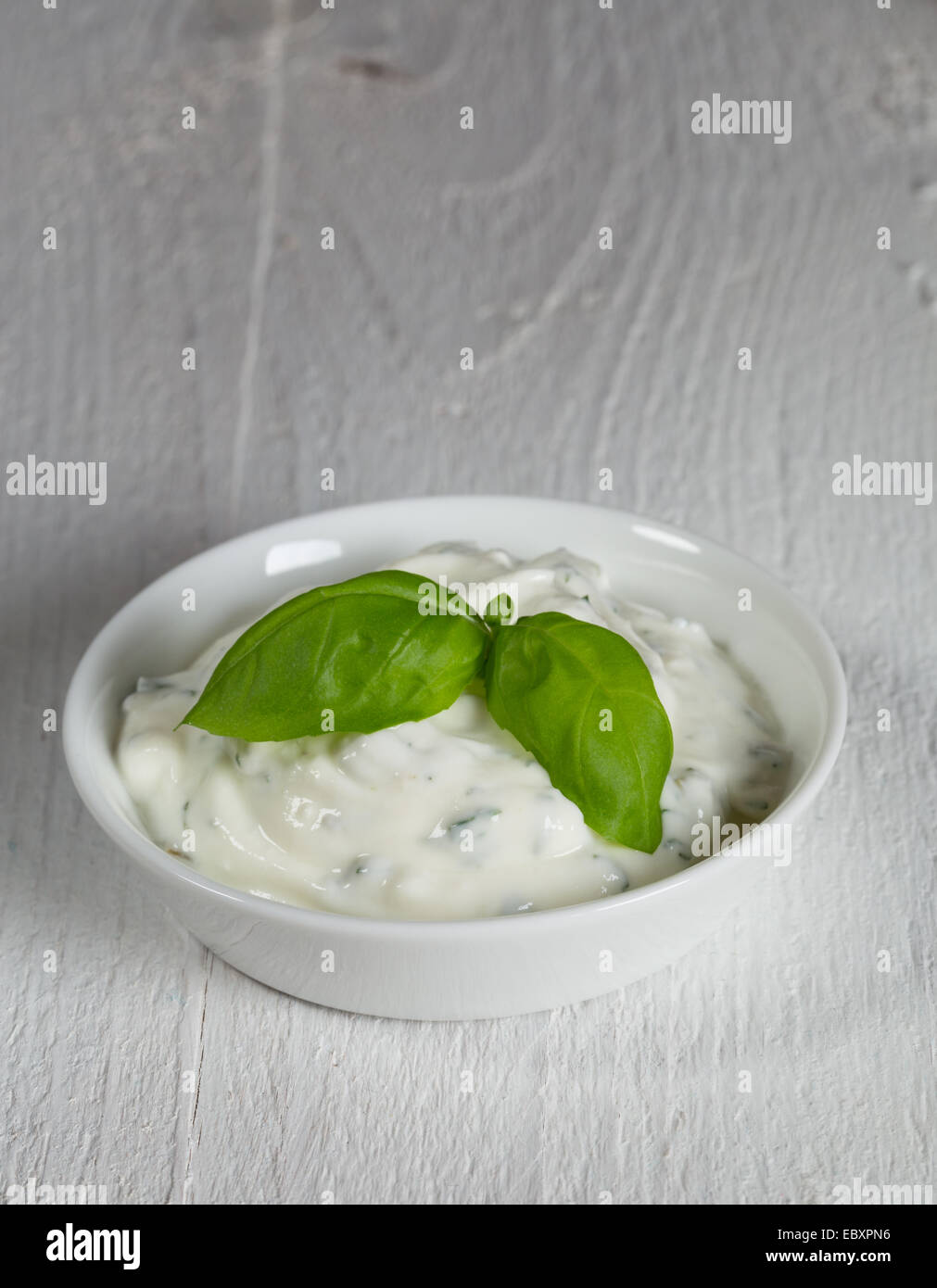 Cream cheese dip with basil Stock Photo Alamy