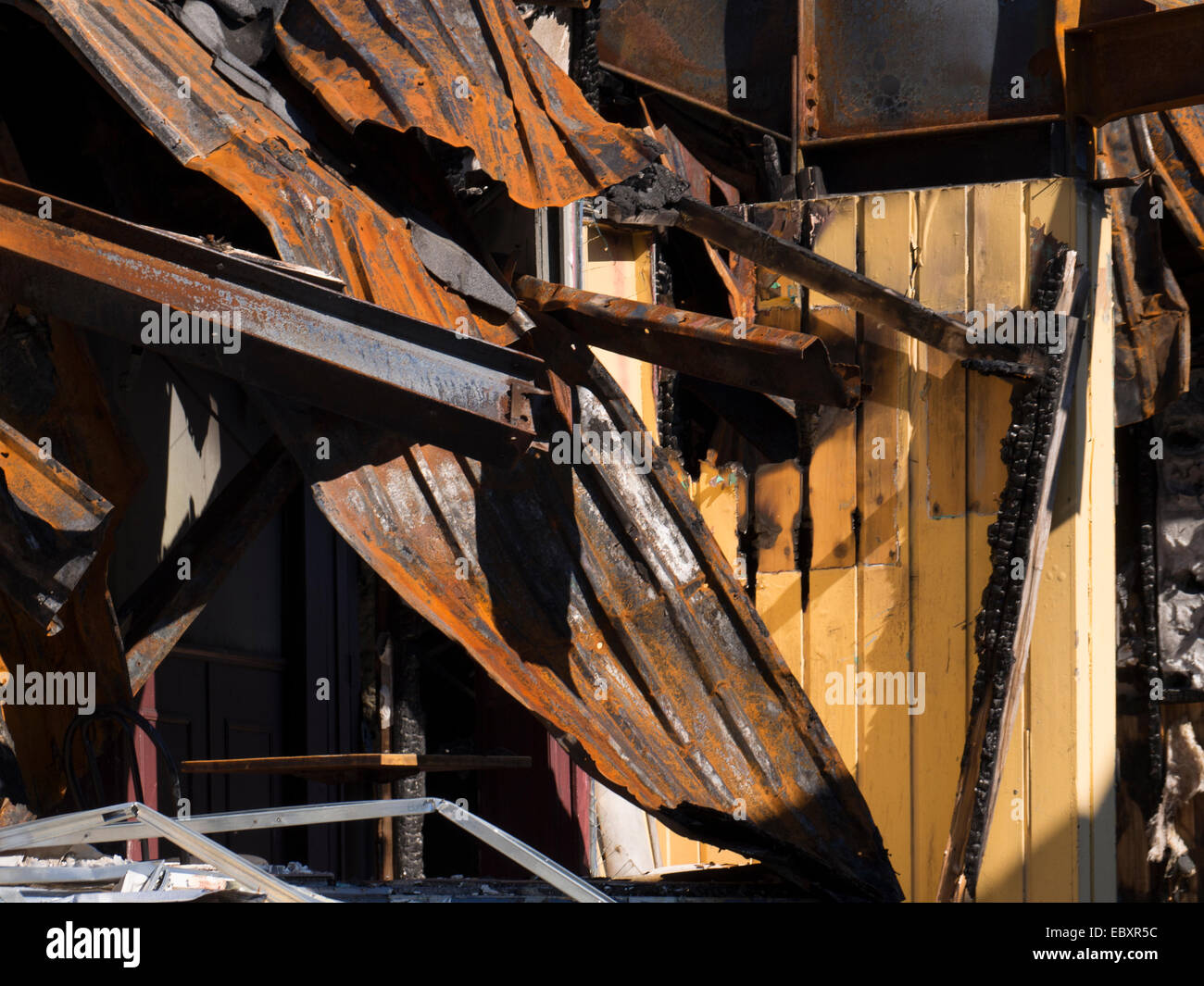 Burned down home, pipes, metal Stock Photo Alamy