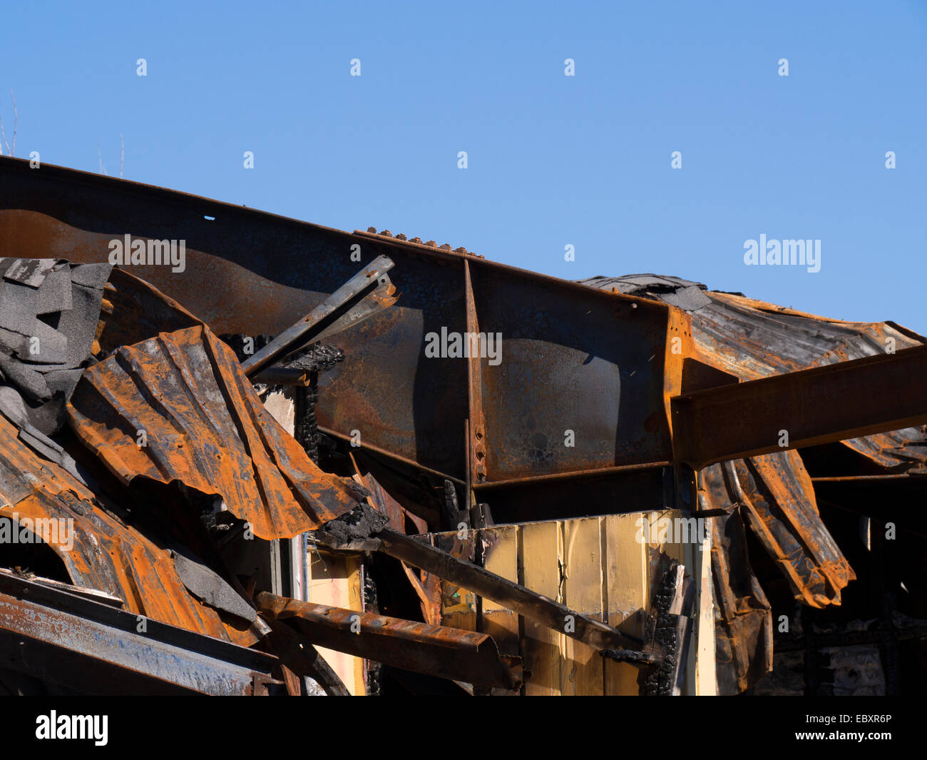 Burned down home, pipes, metal Stock Photo - Alamy