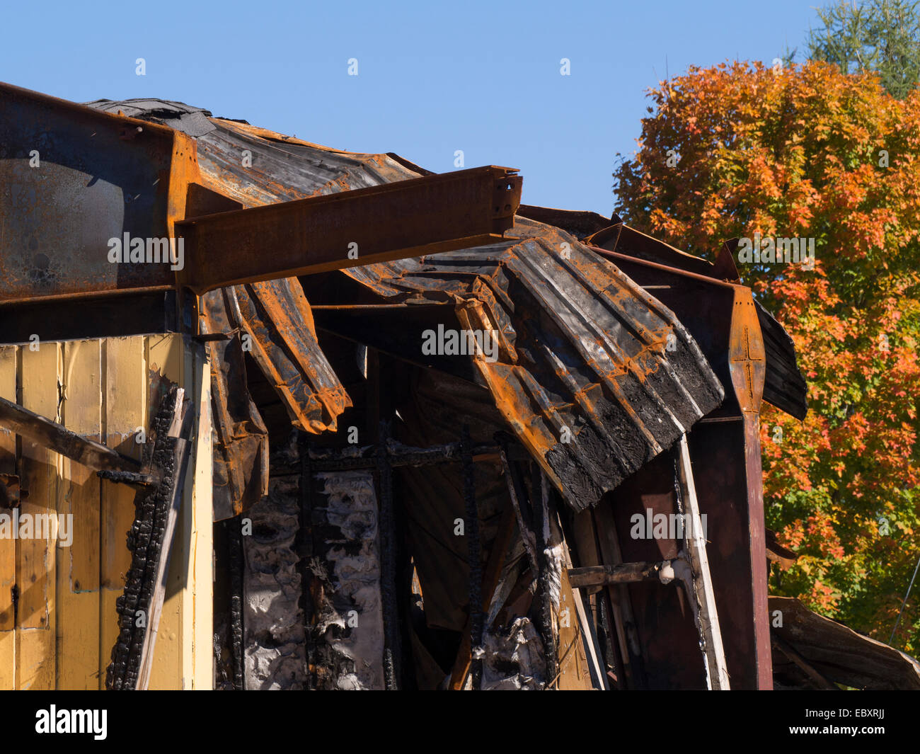 Burned down home, pipes, metal Stock Photo - Alamy