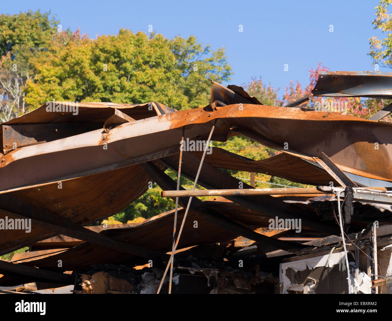 Burned down home, pipes, metal Stock Photo - Alamy