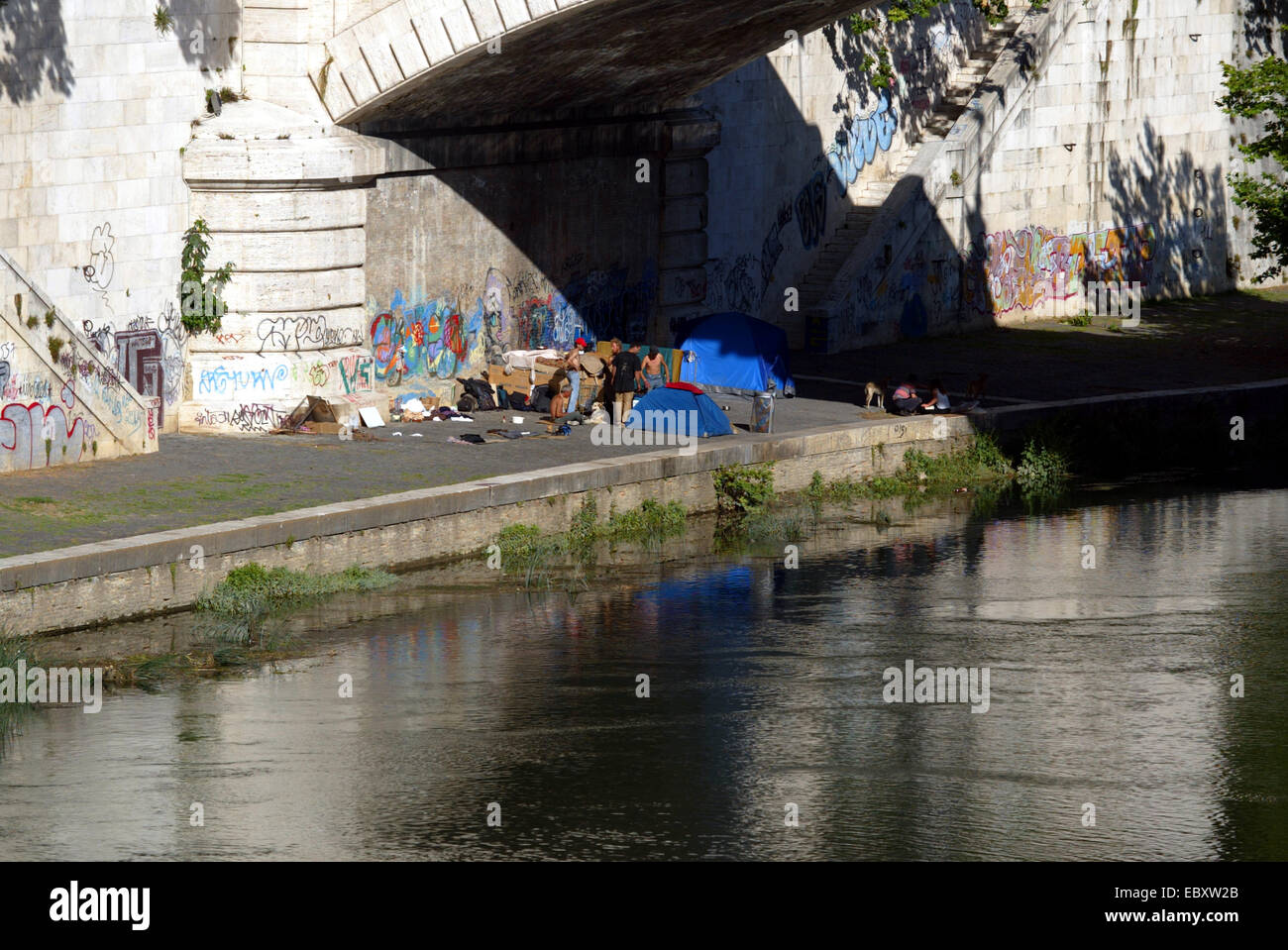 homeless people under bridge in Rome Stock Photo Alamy