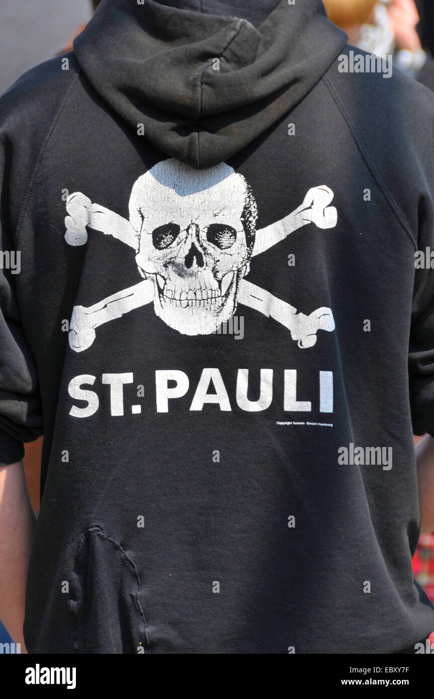 St Pauli fan with typical skull logo on hoody, Germany, Baden-Wuerttemberg Stock Photo