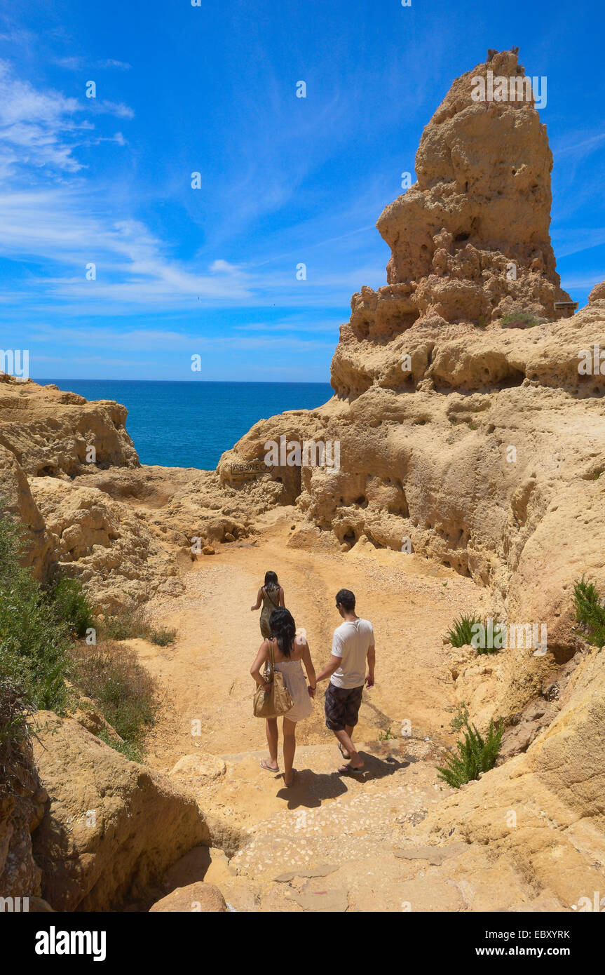 Tourists at the coast, Algar Seco, Carvoeiro, Lagoa, Algarve, Portugal, Europe Stock Photo