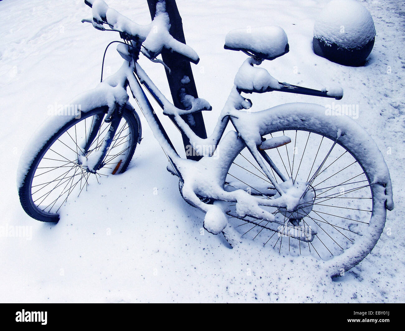 bike in the snow Stock Photo Alamy