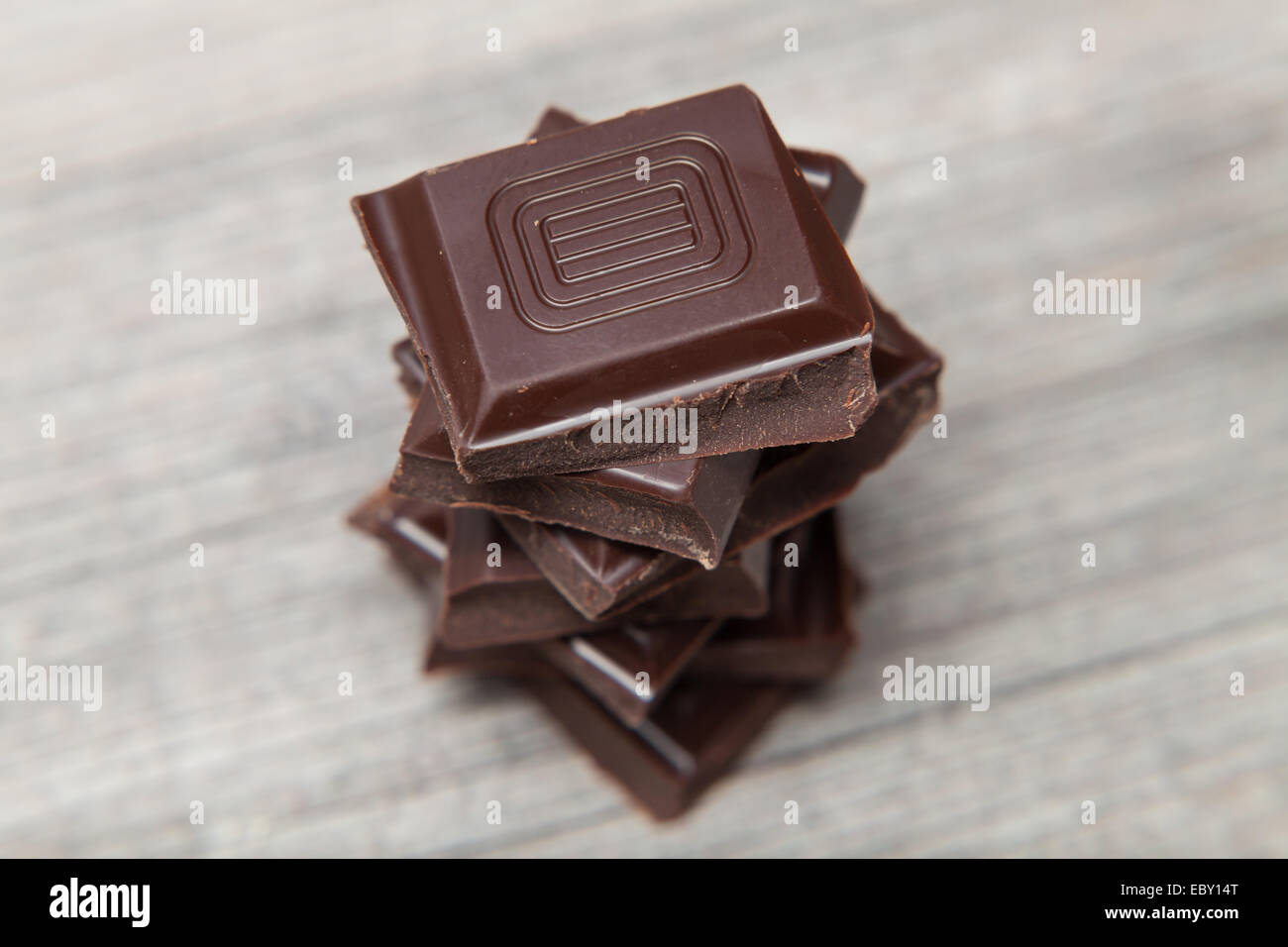 stack of chocolate on grey table Stock Photo