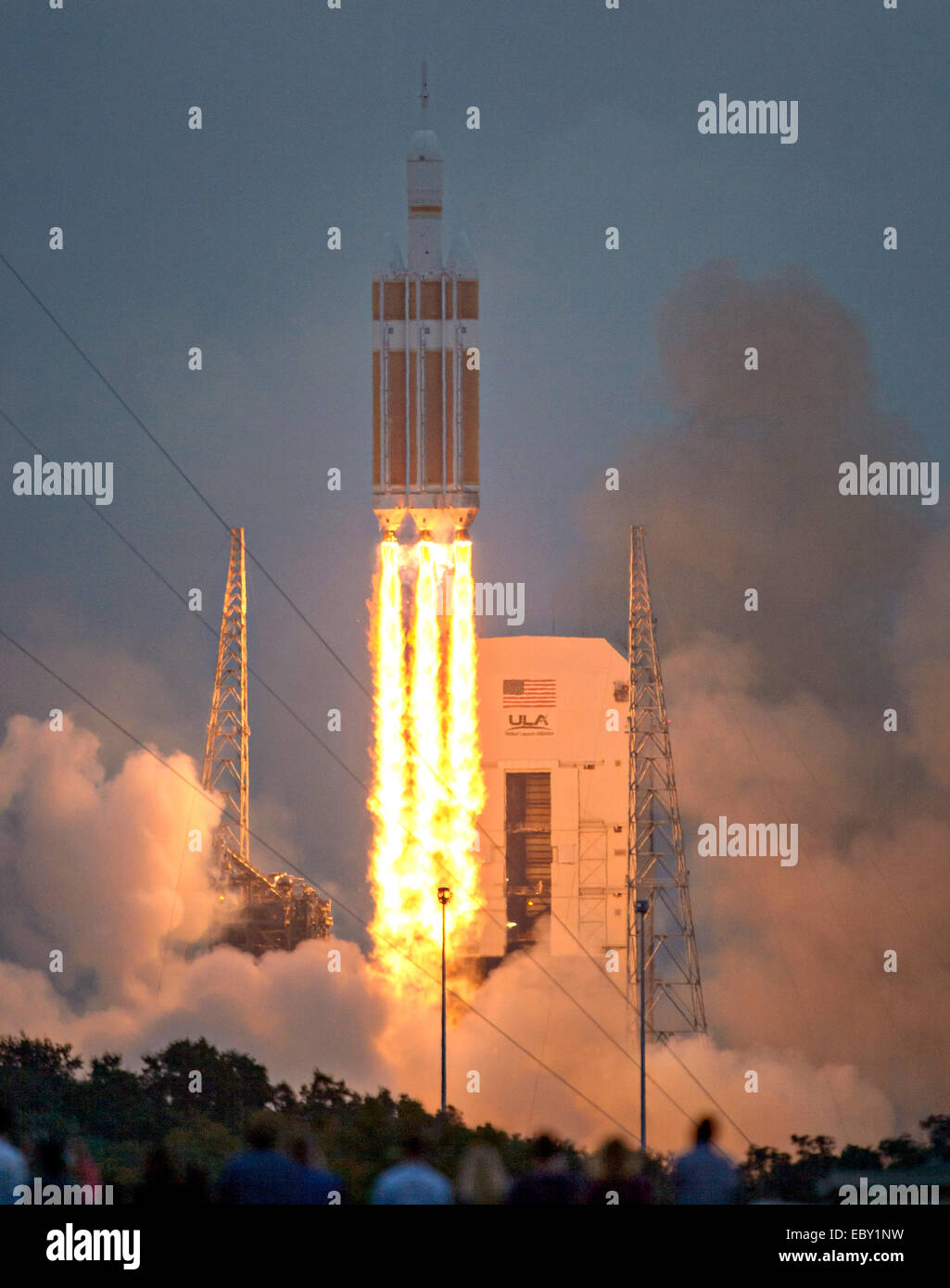 NASA's Orion spacecraft mounted atop a United Launch Alliance Delta IV Heavy rocket lifts off at Space Launch Complex 37 December 5, 2014 in Cape Canaveral, Florida. The unmanned Orion spacecraft will orbit Earth twice, reaching an altitude of approximately 3,600 miles above Earth before landing in the Pacific Ocean. Stock Photo
