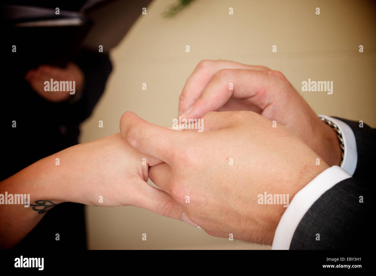 Bride and Groom exchanging rings. Stock Photo