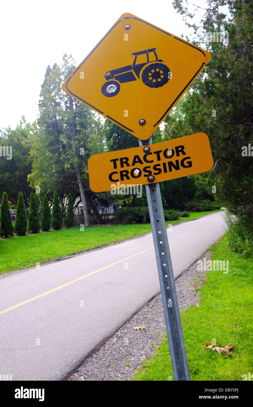 A tractor crossing sign in a Canadian park Stock Photo - Alamy