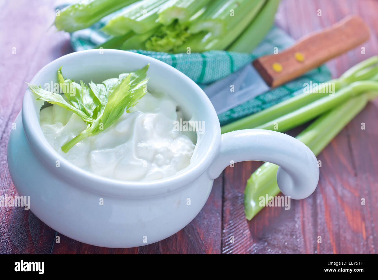 fresh celery and white sauce Stock Photo Alamy