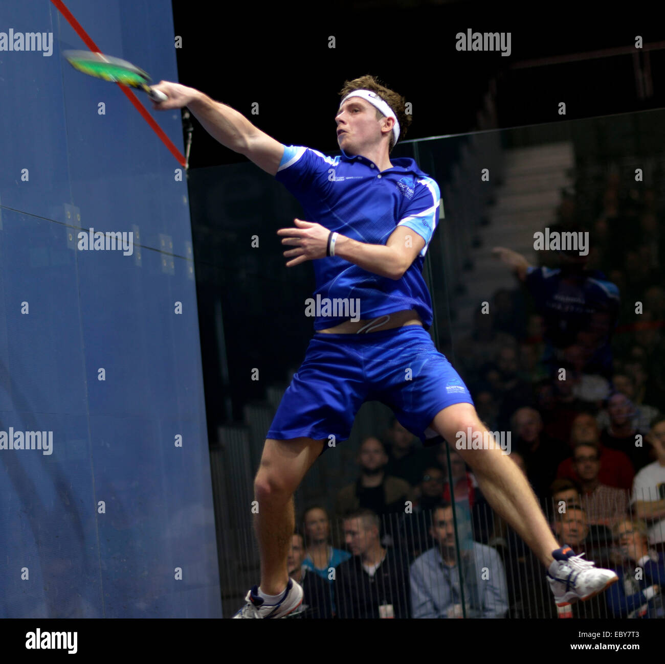 Manchester, UK. 5th December, 2014. Greg Lobban (Scotland) loses   his first round match of the A J Bell British Squash Grand Prix  to Nick Matthew (England), three times world champion.  British Squash Grand Prix Sportcity,  Manchester, UK Credit:  John Fryer/Alamy Live News Stock Photo