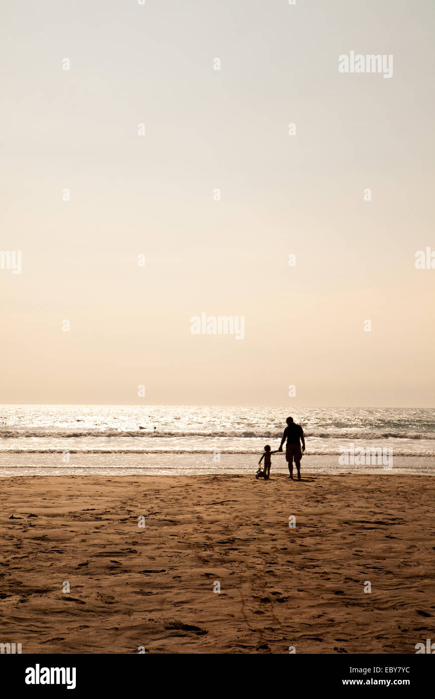 Father and child enjoying quality time in the late afternoon sun Stock Photo