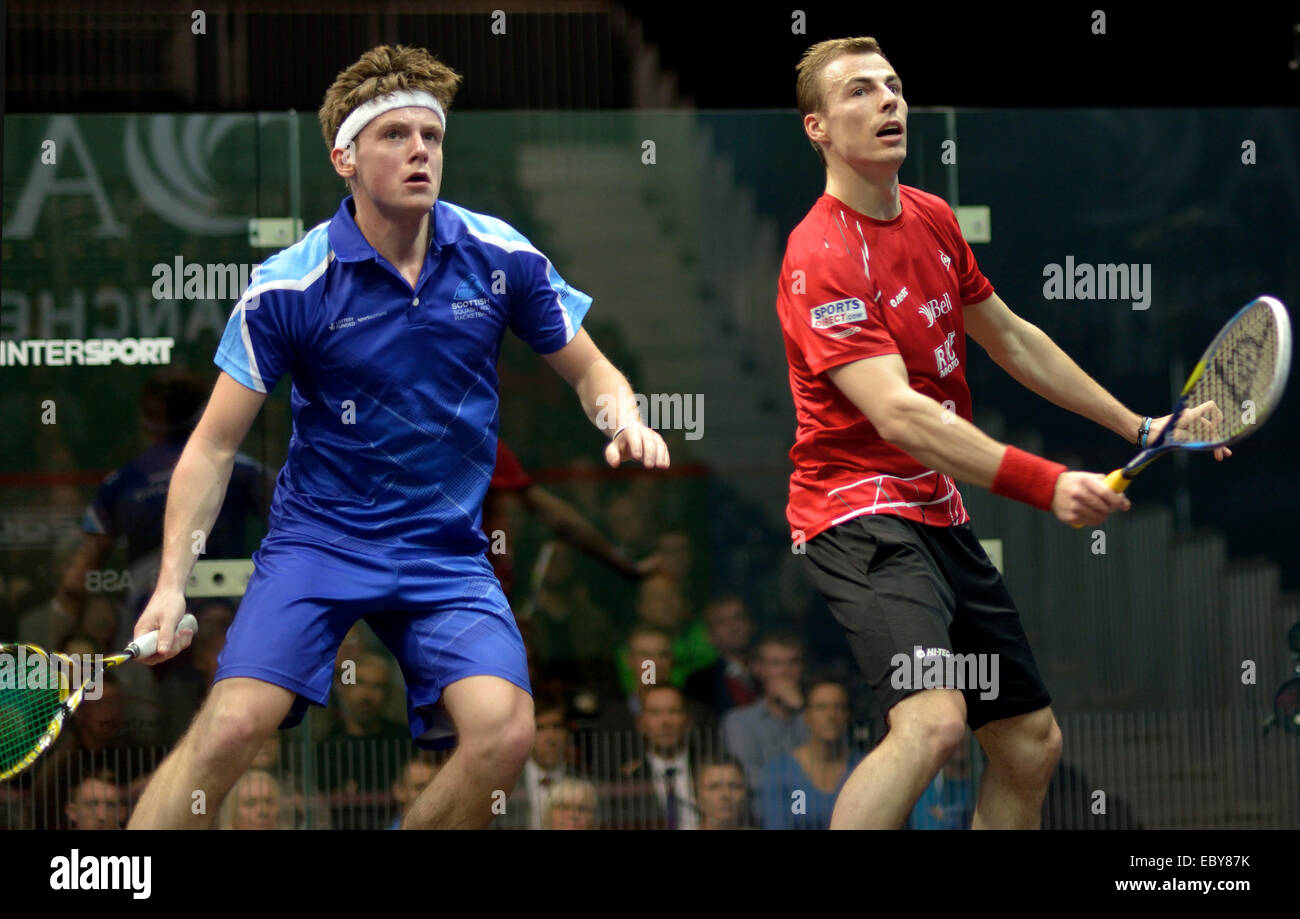 Manchester, UK. 5th December, 2014. Nick Matthew (England), in red  three times world champion wins his first round match of the A J Bell British Squash Grand Prix against Greg Lobban (Scotland).  British Squash Grand Prix Sportcity,  Manchester, UK Credit:  John Fryer/Alamy Live News Stock Photo