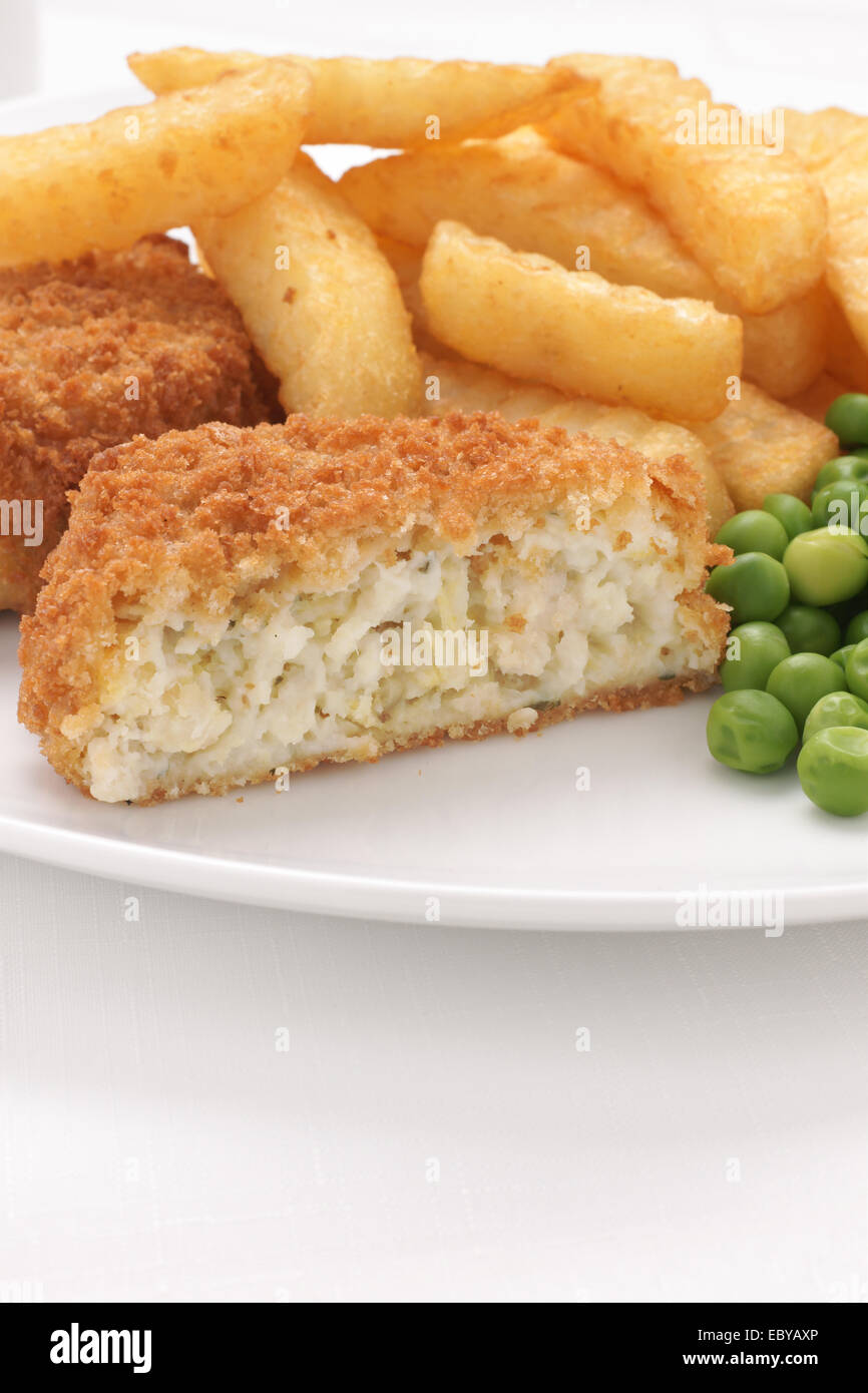 Fishcake made with crumbed fish and potato served with chips and peas