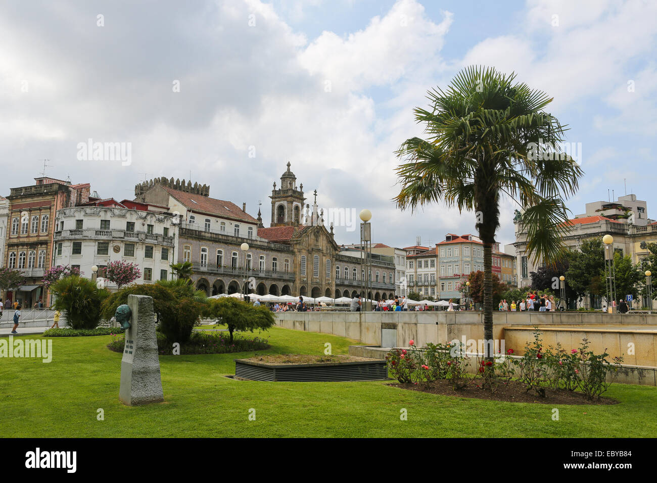 BRAGA, PORTUGAL - AUGUST 9, 2014:  Remnants of the Castle of Braga, the Keep Tower,  and other historic buildings at the Avenida Stock Photo