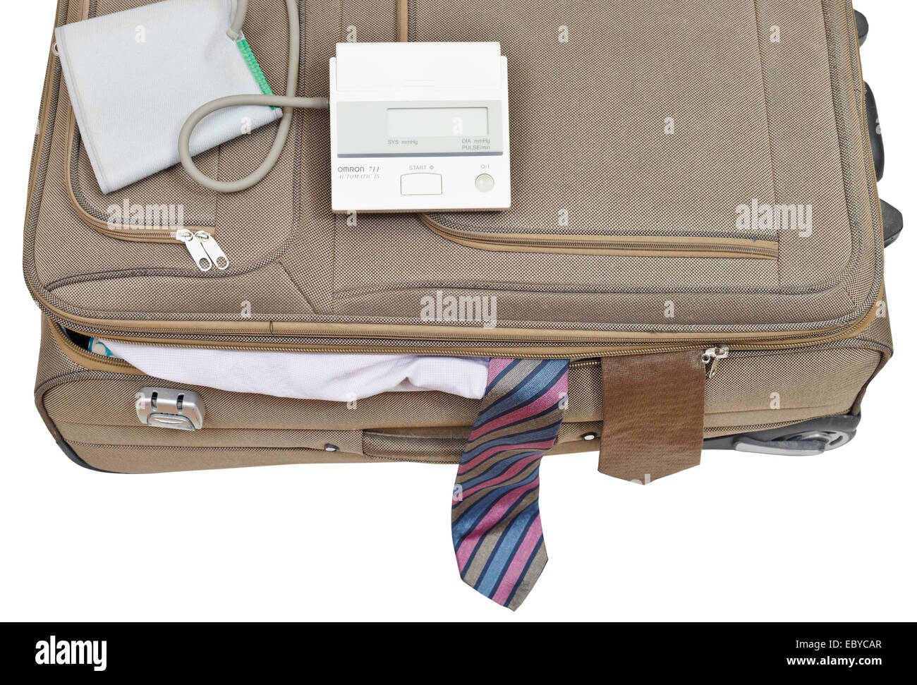 blood pressure monitor on suitcase with male ties isolated on white