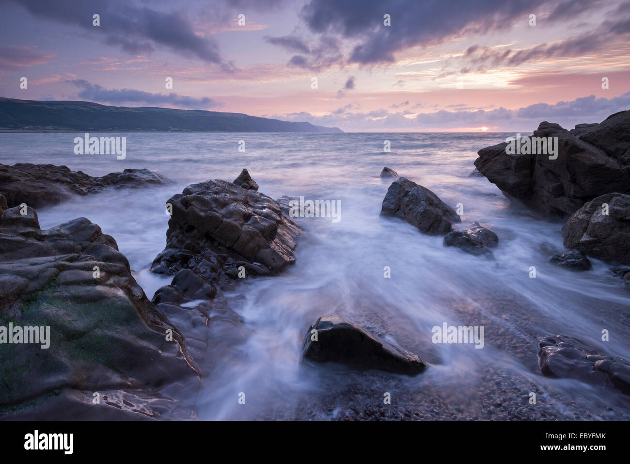 Sunset over Porlock Bay, Exmoor National Park, Somerset, England. Summer (August) 2014. Stock Photo