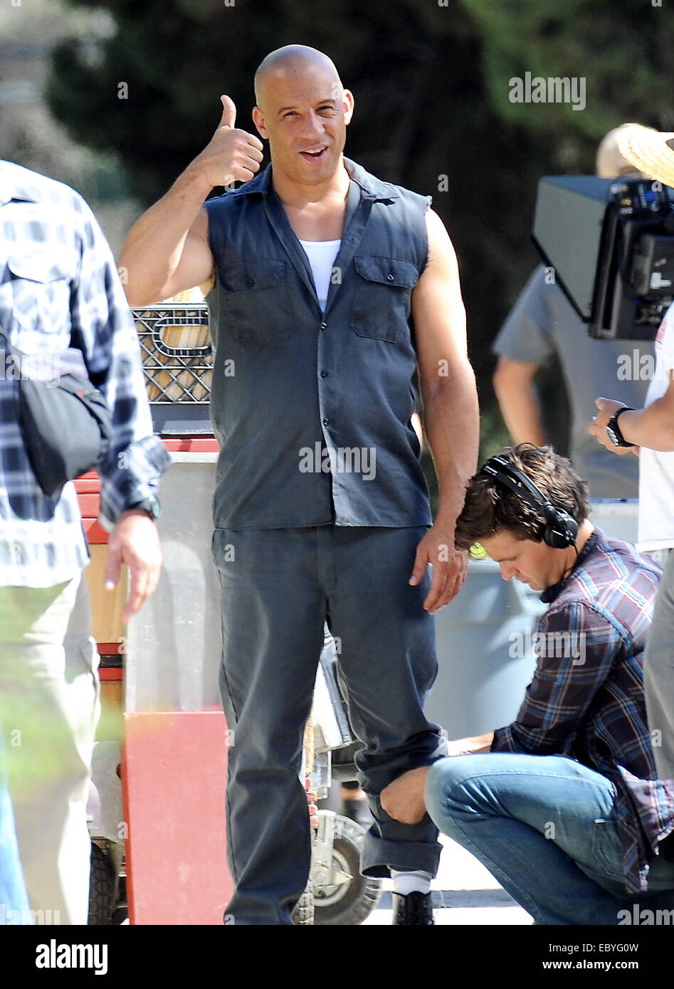 Actor Vin Diesel gives a thumbs up to onlookers on the set of 
