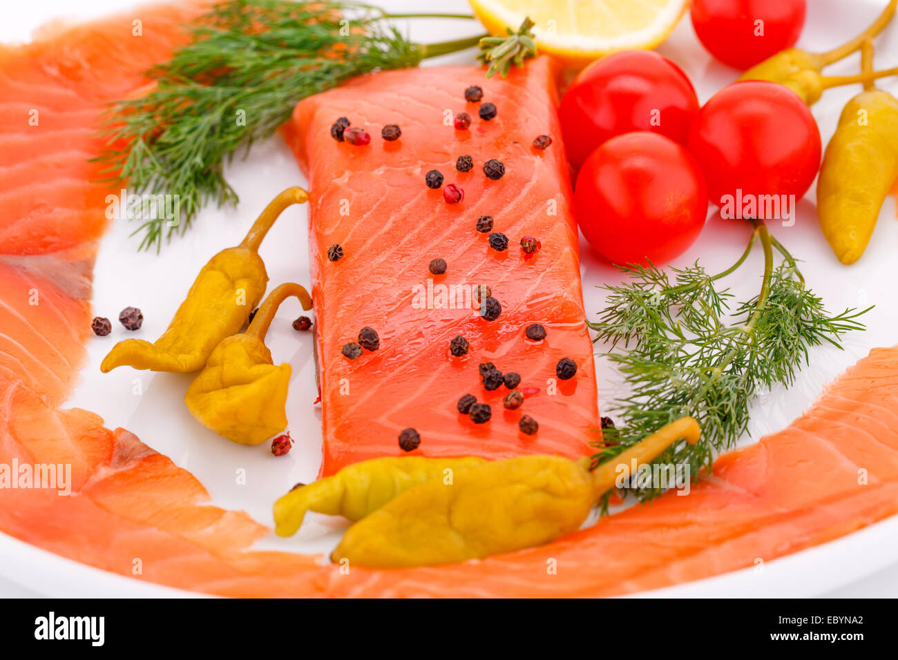 Salmon fillet with lemon, dill, pepper on plate Stock Photo Alamy