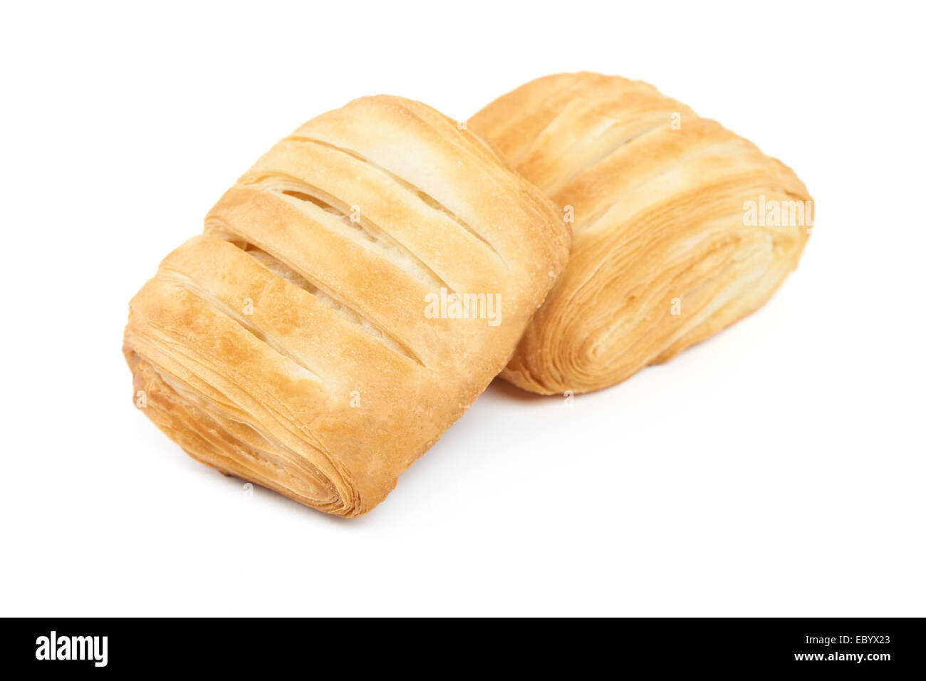 Two pieces of puff pastry isolated on white Stock Photo