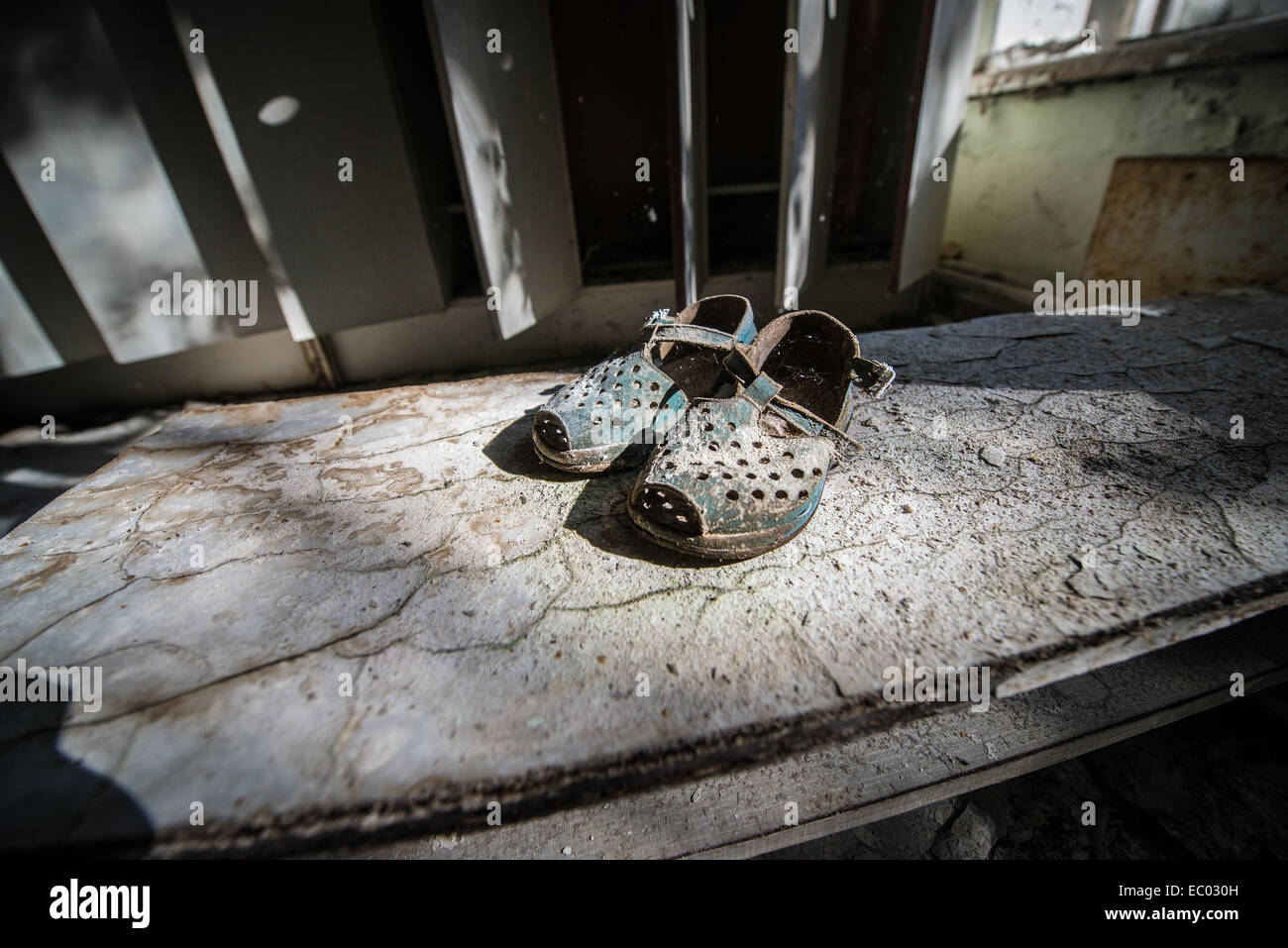 shoes in Kindergarten 'Cheburashka' in Pripyat abandoned city, Chernobyl Exclusion Zone, Ukraine Stock Photo