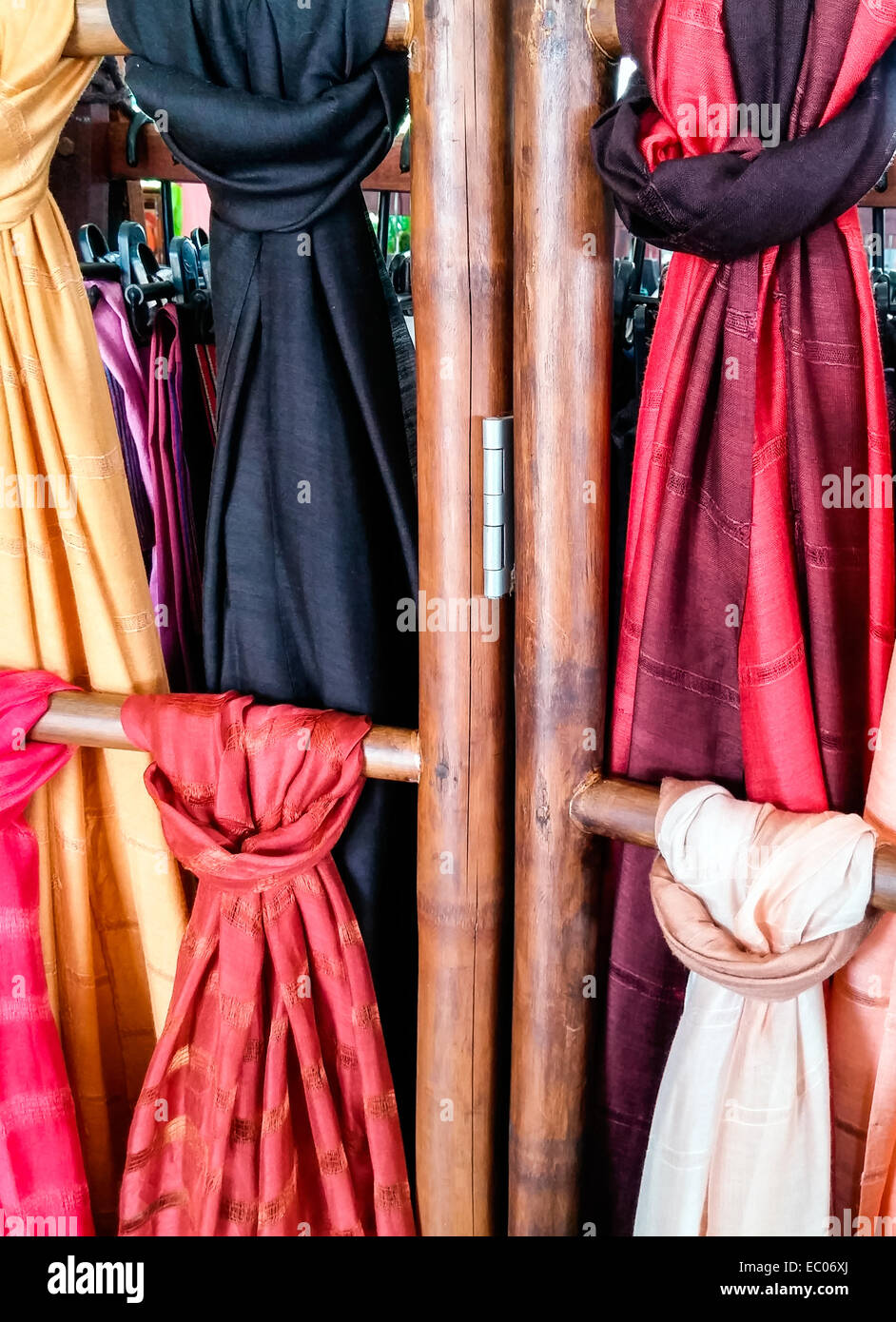 Colorful silk shawls in the Thai gift shop. Stock Photo