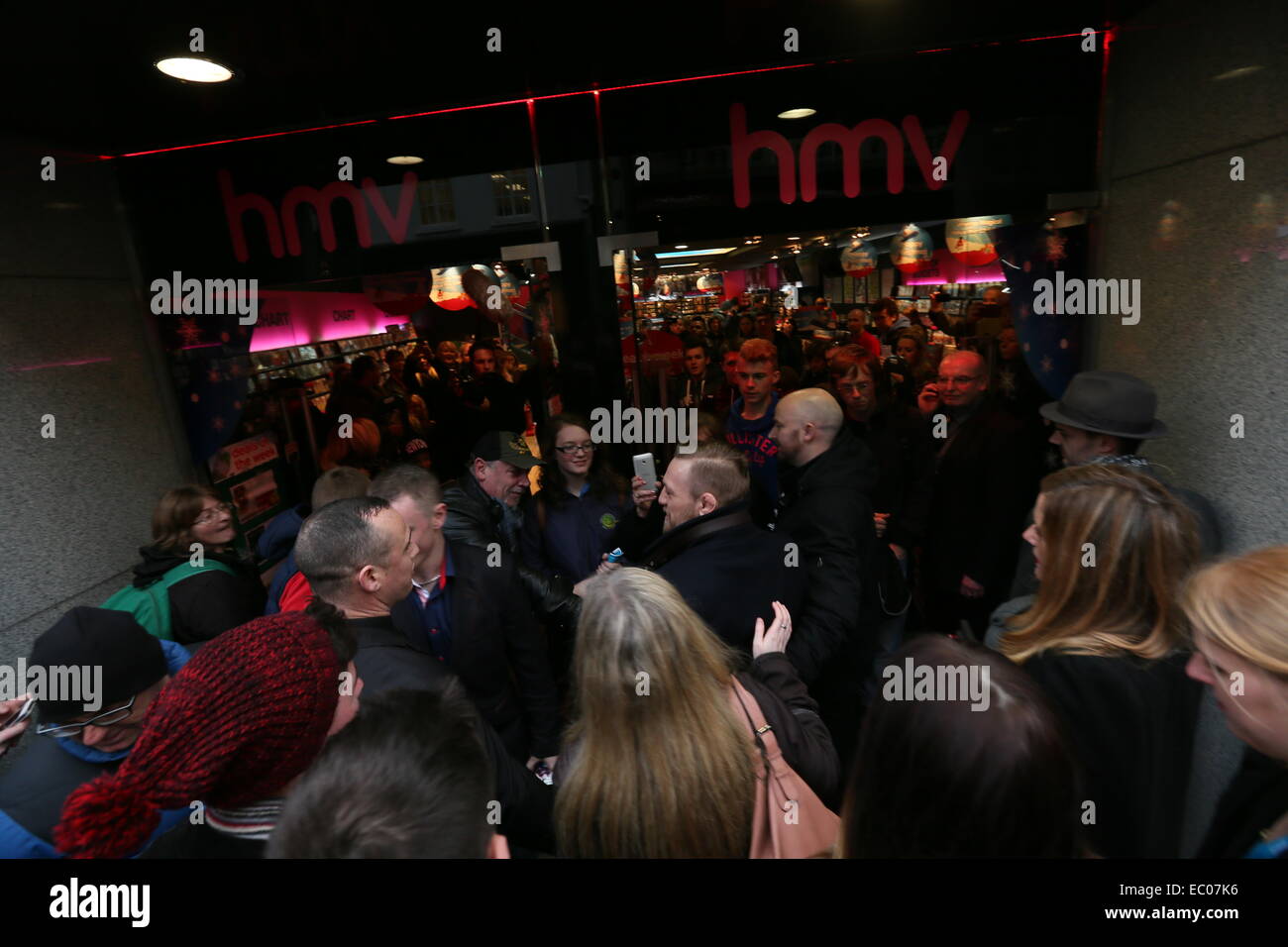 Dublin, Ireland. 06th Dec, 2014. Image of Irish UFC star Conor McGregor on his way into music retailer HMV on Grafton Street to take part in an event to sign his new documentary dvd entitled 'Notorious'. Credit:  Brendan Donnelly/Alamy Live News Stock Photo