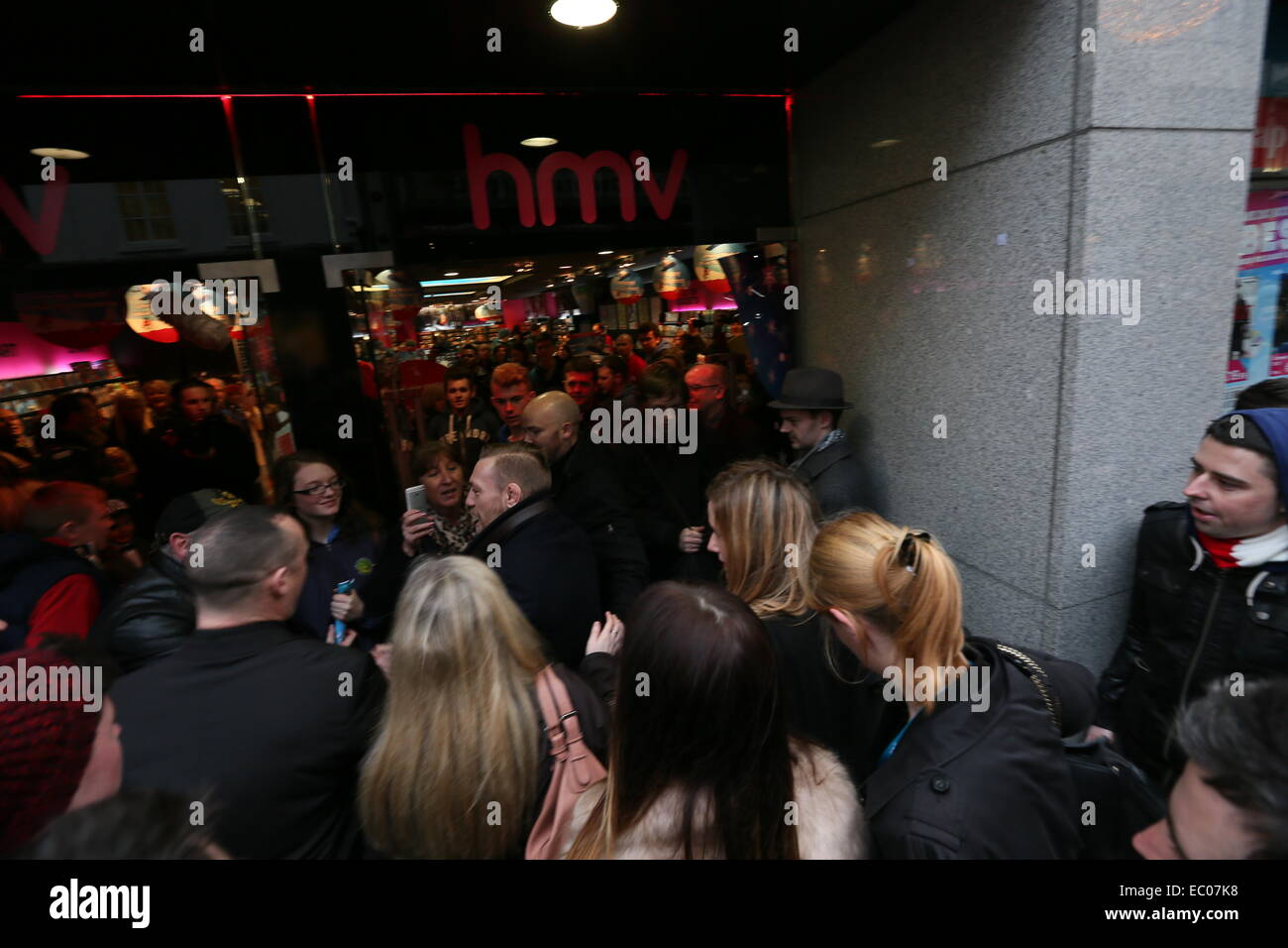 Dublin, Ireland. 06th Dec, 2014. Image of Irish UFC star Conor McGregor on his way into music retailer HMV on Grafton Street to take part in an event to sign his new documentary dvd entitled 'Notorious'. Credit:  Brendan Donnelly/Alamy Live News Stock Photo