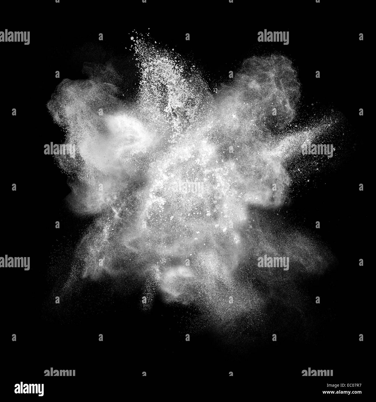 White powder explosion isolated on black background Stock Photo - Alamy