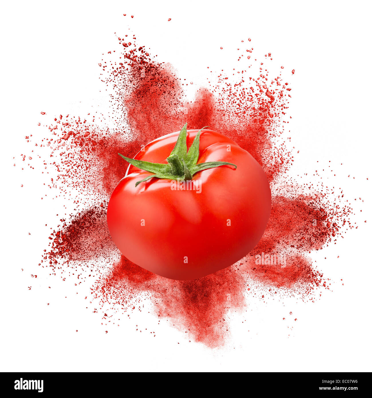 Tomato with red powder explosion isolated on white background Stock