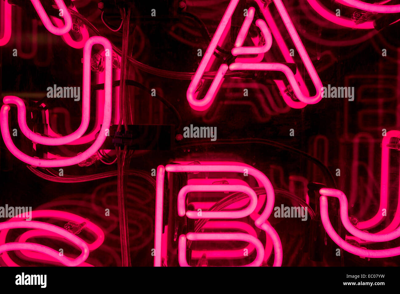Bright Pink Neon Letters Stock Photo