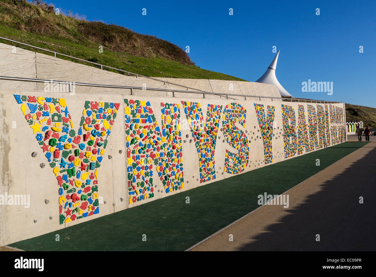 New public climbing wall opened December 2014 at Barry Island writing in Welsh and English, Wales, UK Stock Photo