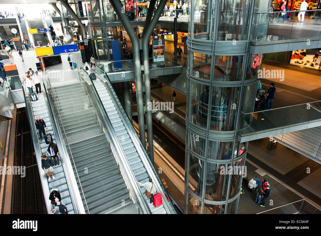 Escalators, stairs and an elevator in Berlin's main train station, the Hauptbahnhof, to move people between levels. Stock Photo