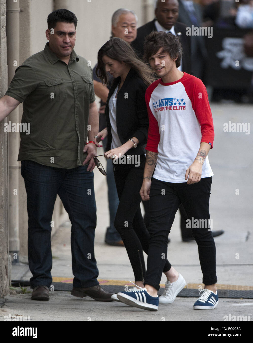 Hollywood, California, USA. 20th Nov, 2014. English rocker, LOUIS TOMLINSON,  from the British boy band, One Direction, arrives for his appearance at  Jimmy Kimmel Live! accompanied by his girlfriend ELEANOR CALDER on, image size:1026x1390