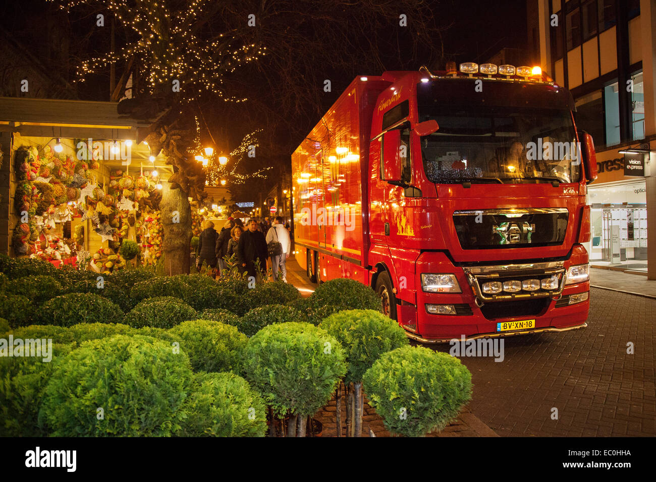 Dutch bulbs; MAN Red Delivery Vehicles 'Holland Flower Market' delivering plants, bulbs & festive goods to Chester Christmas Market, Cheshire, UK Stock Photo