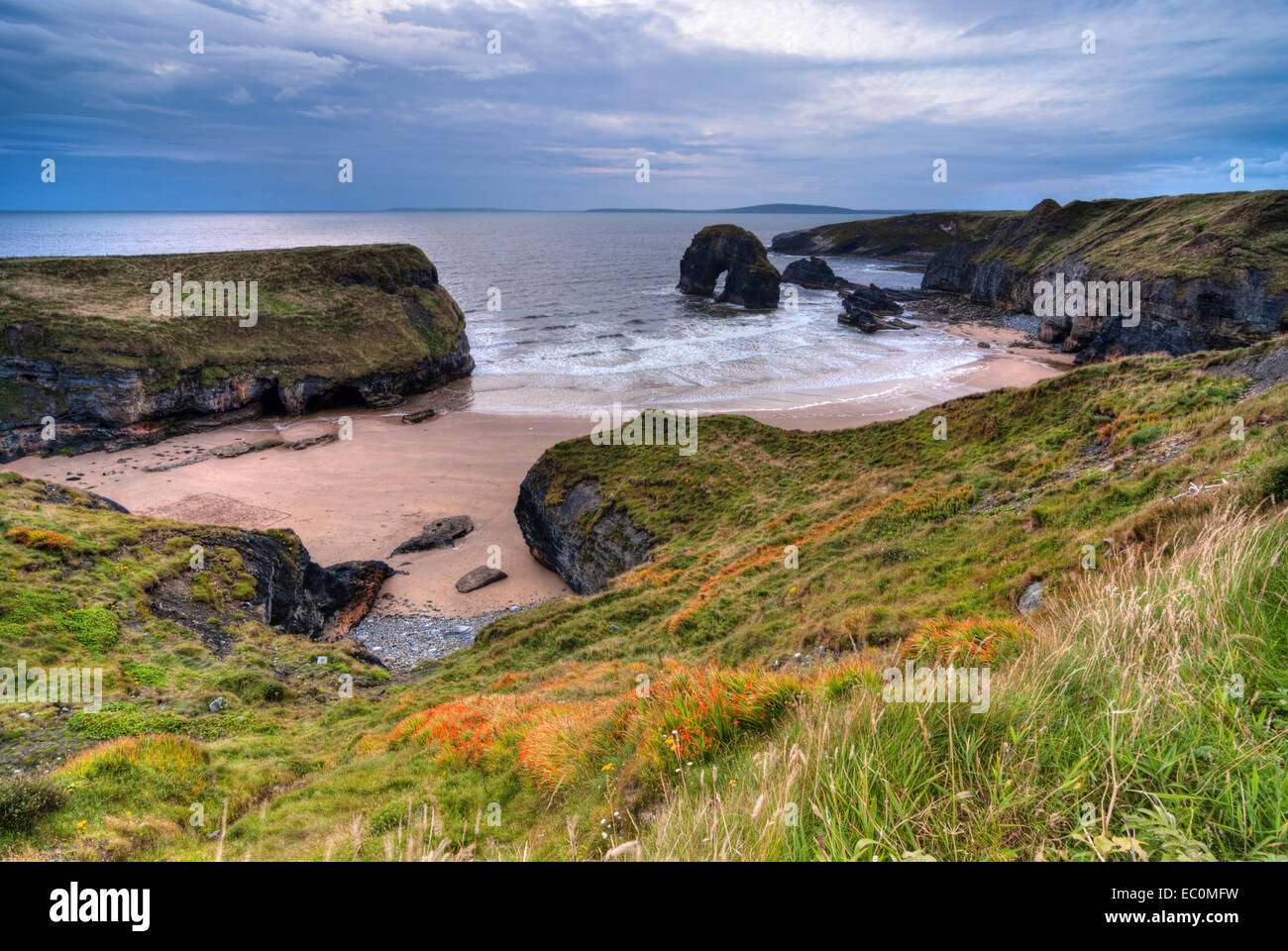 Cliff over Atlantic Ocean at Irish coastline Stock Photo