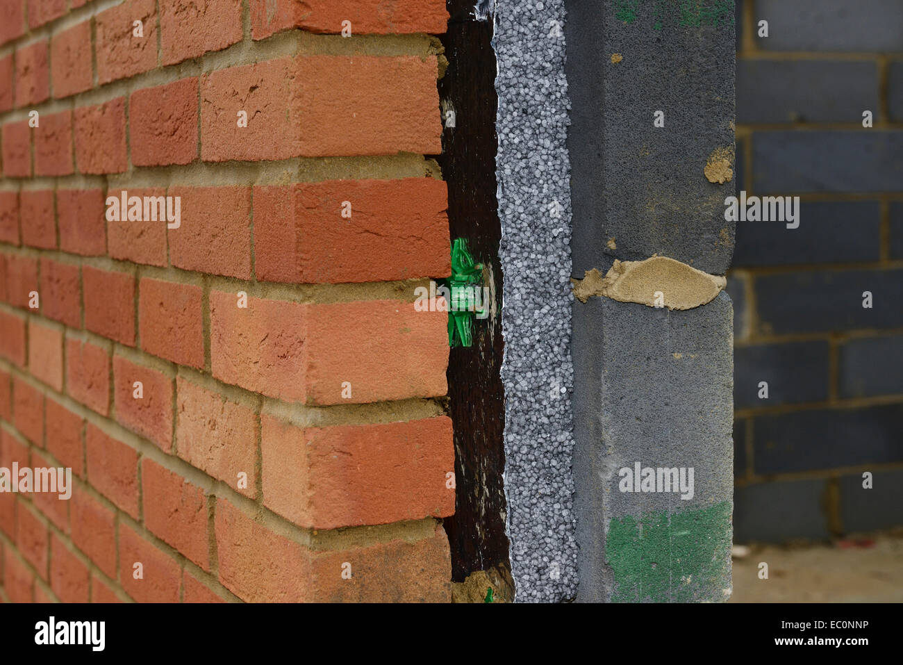 Cross section detail of a modern cavity wall on a house Stock Photo
