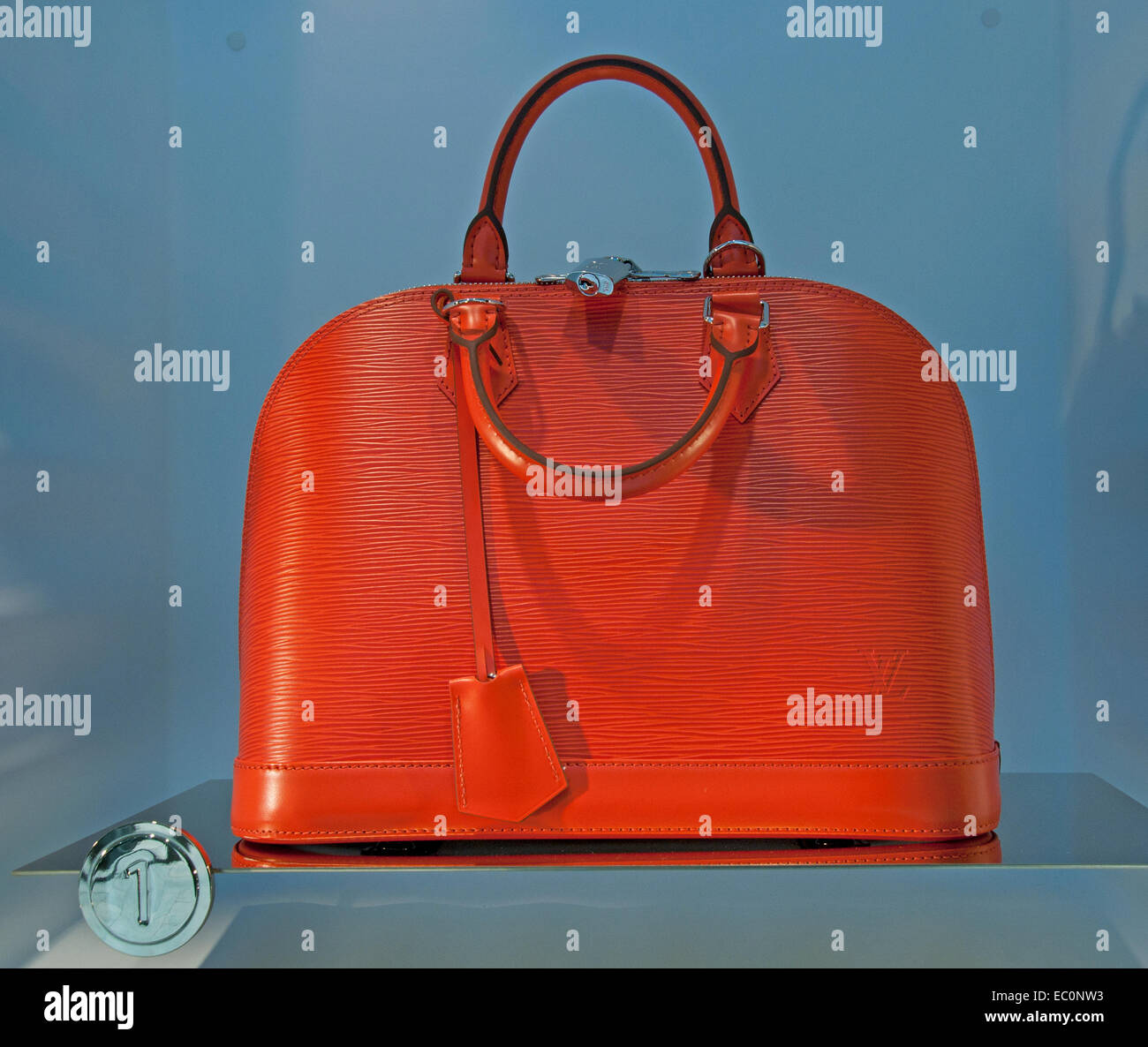 Red leather louis vuitton bag hi-res stock photography and images