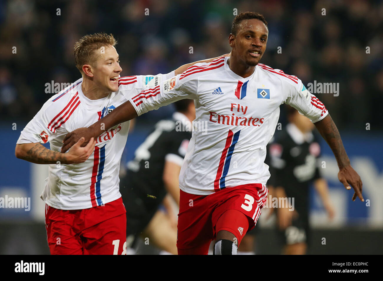 Hamburg, Germany. 07th Dec, 2014. Hamburg's Lewis Holtby (L) and Cleber celebrate the 1-0 goal during the German Bundesliga match between Hamburger SV and FSV Mainz in Hamburg, Germany, 07 December 2014. Photo: MALTE CHRISTIANS/dpa (ATTENTION: Due to the accreditation guidelines, the DFL only permits the publication and utilisation of up to 15 pictures per match on the internet and in online media during the match.)/dpa/Alamy Live News Stock Photo