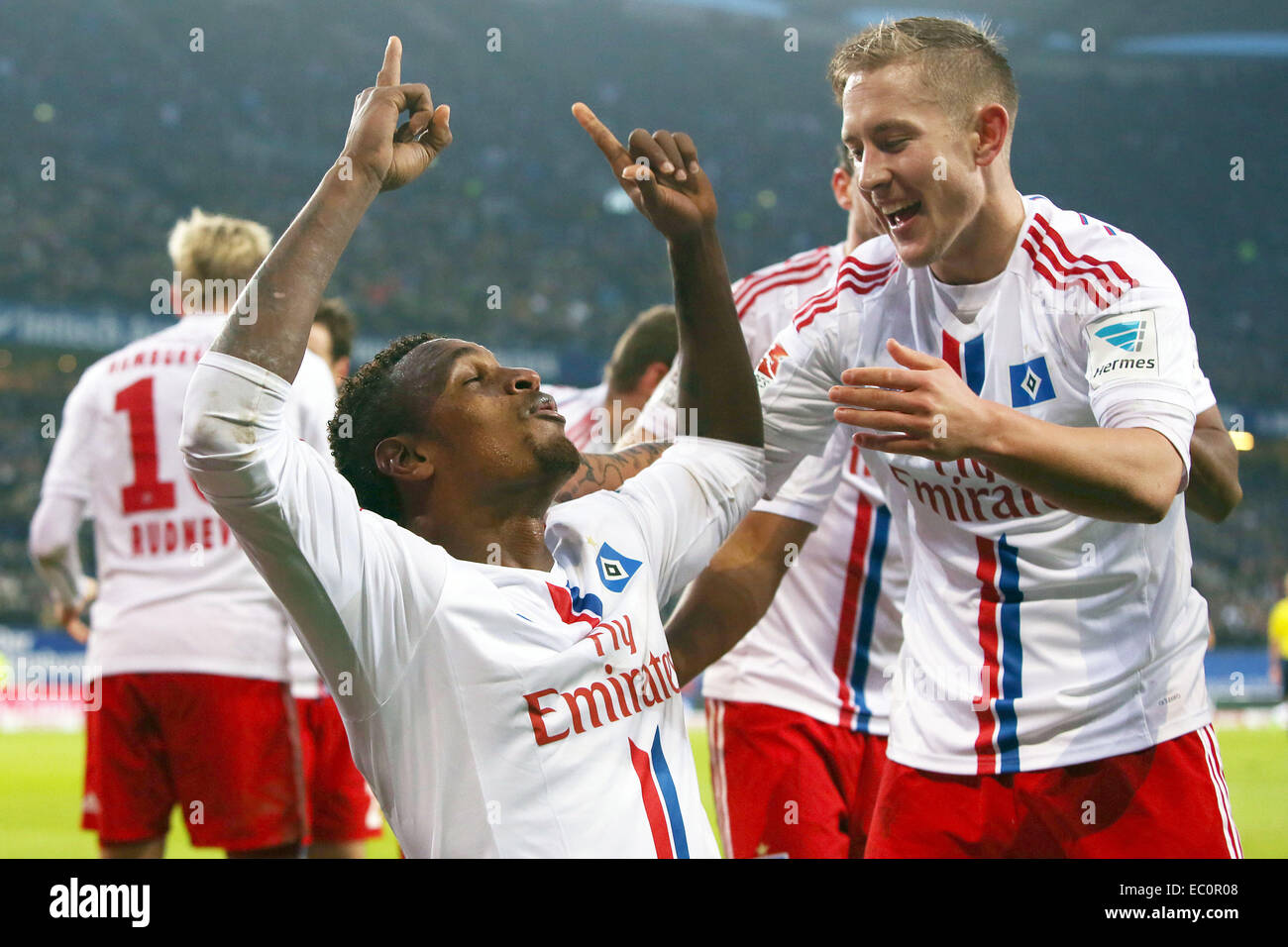 Hamburg, Germany. 07th Dec, 2014. Hamburg's Lewis Holtby celebrates the 1-0 goal by Cleber Reis (L) during the German Bundesliga match between Hamburger SV and FSV Mainz in Hamburg, Germany, 07 December 2014. Photo: MALTE CHRISTIANS/dpa (ATTENTION: Due to the accreditation guidelines, the DFL only permits the publication and utilisation of up to 15 pictures per match on the internet and in online media during the match.)/dpa/Alamy Live News Stock Photo