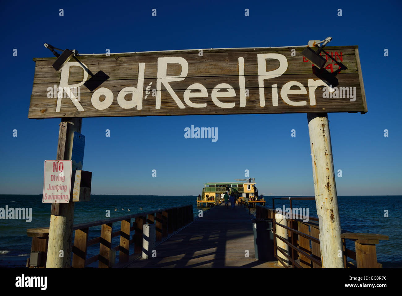 The quaint Rod & Reel Pier restaurant at sunset, Anna Maria Island FL Stock Photo