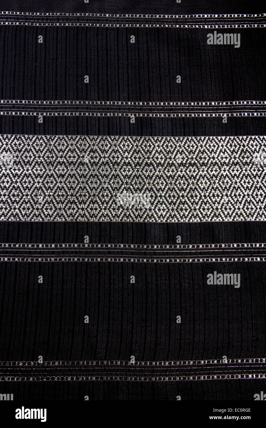 Thai Silk, Slub woven with silver thread and black silk Stock Photo