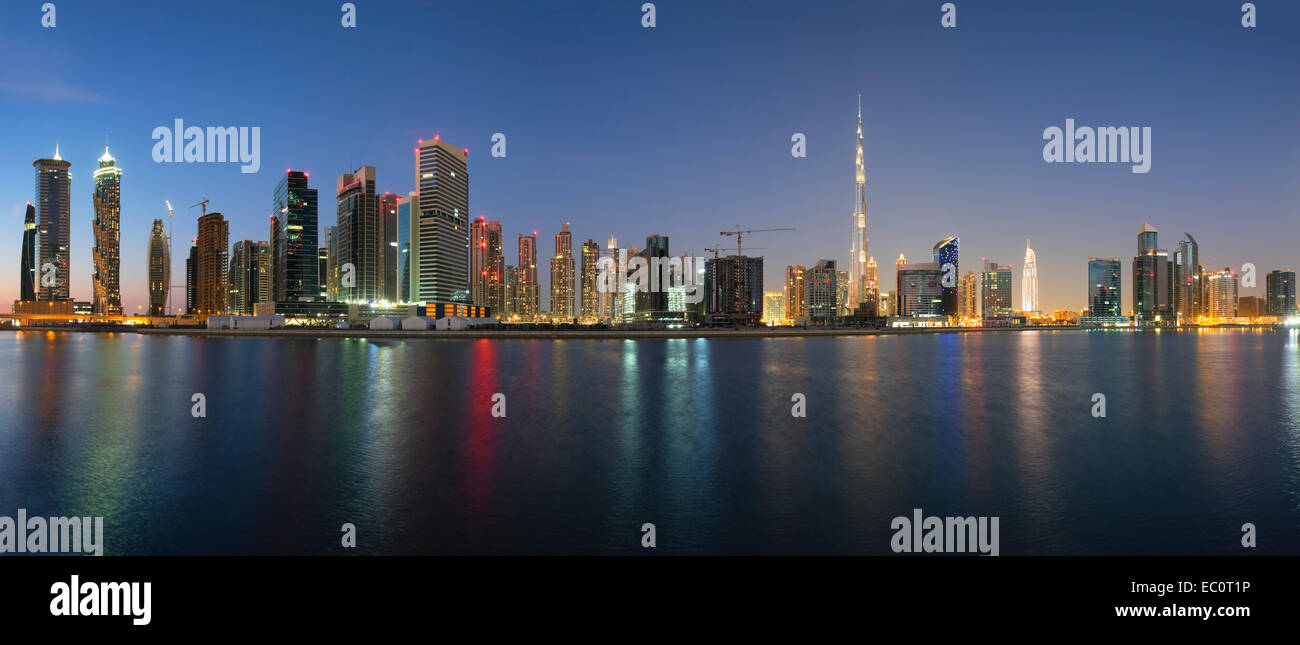 Evening skyline view of Burj Khalifa and Dubai from Business Bay district in United Arab Emirates Stock Photo